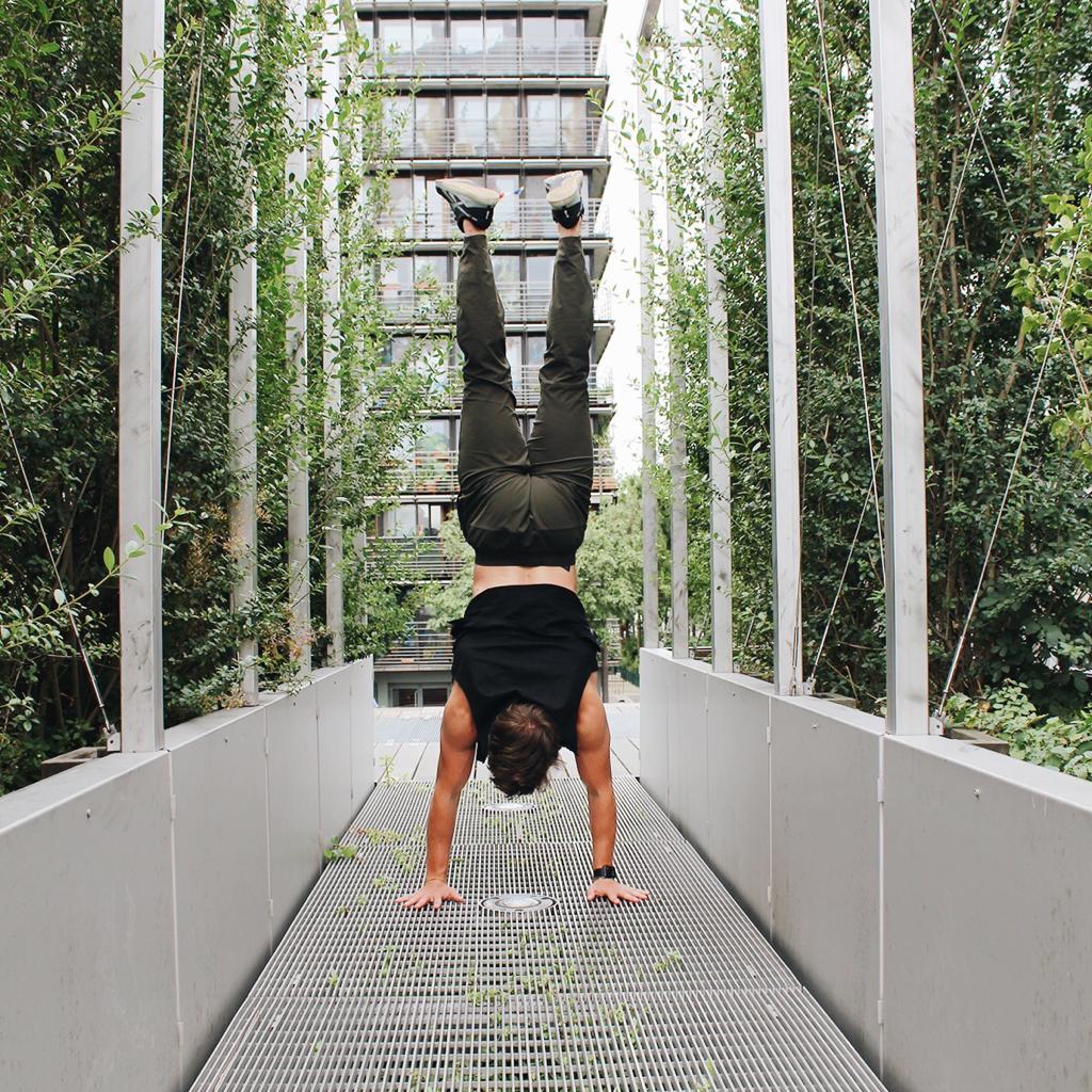 Men doing handstand